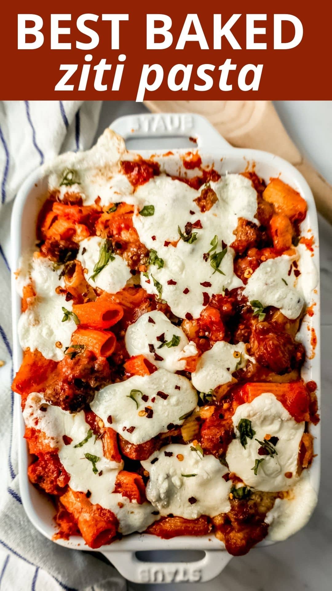 This Baked Ziti Pasta is made with ziti noodles, sausage, marinara sauce, fresh basil, spices, whole milk mozzarella cheese, parmesan cheese, and heavy cream and baked until the cheese is melted. The best-baked ziti recipe! This is a perfect recipe to freeze or make ahead of time.