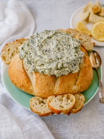 This easy spinach dip is made with spinach, cream cheese, sour cream, ranch powder, and water chestnuts. This cold spinach dip is made with only 5 ingredients and is always a hit at parties!