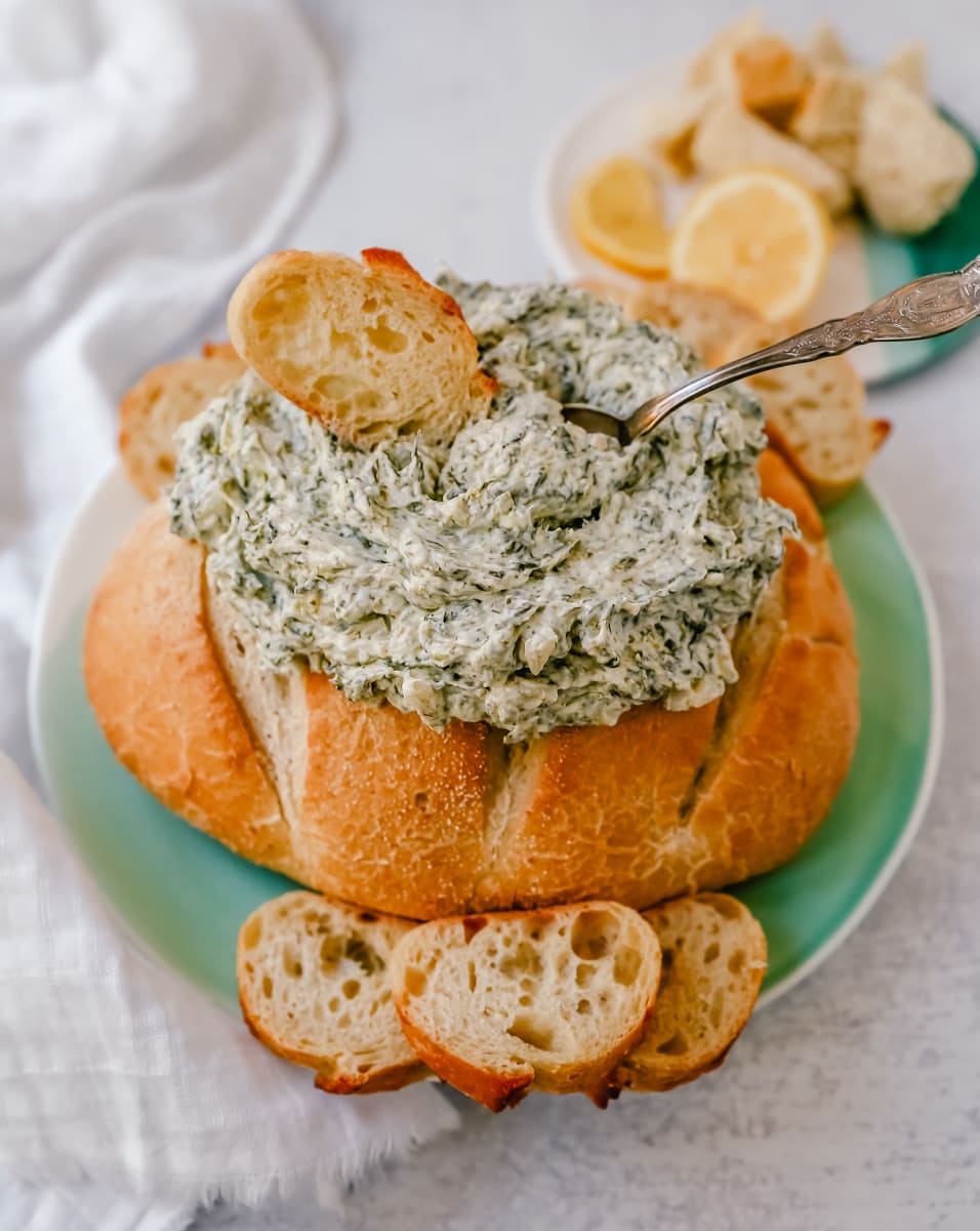 This easy spinach dip is made with spinach, cream cheese, sour cream, ranch powder, and water chestnuts. This cold spinach dip is made with only 5 ingredients and is always a hit at parties!