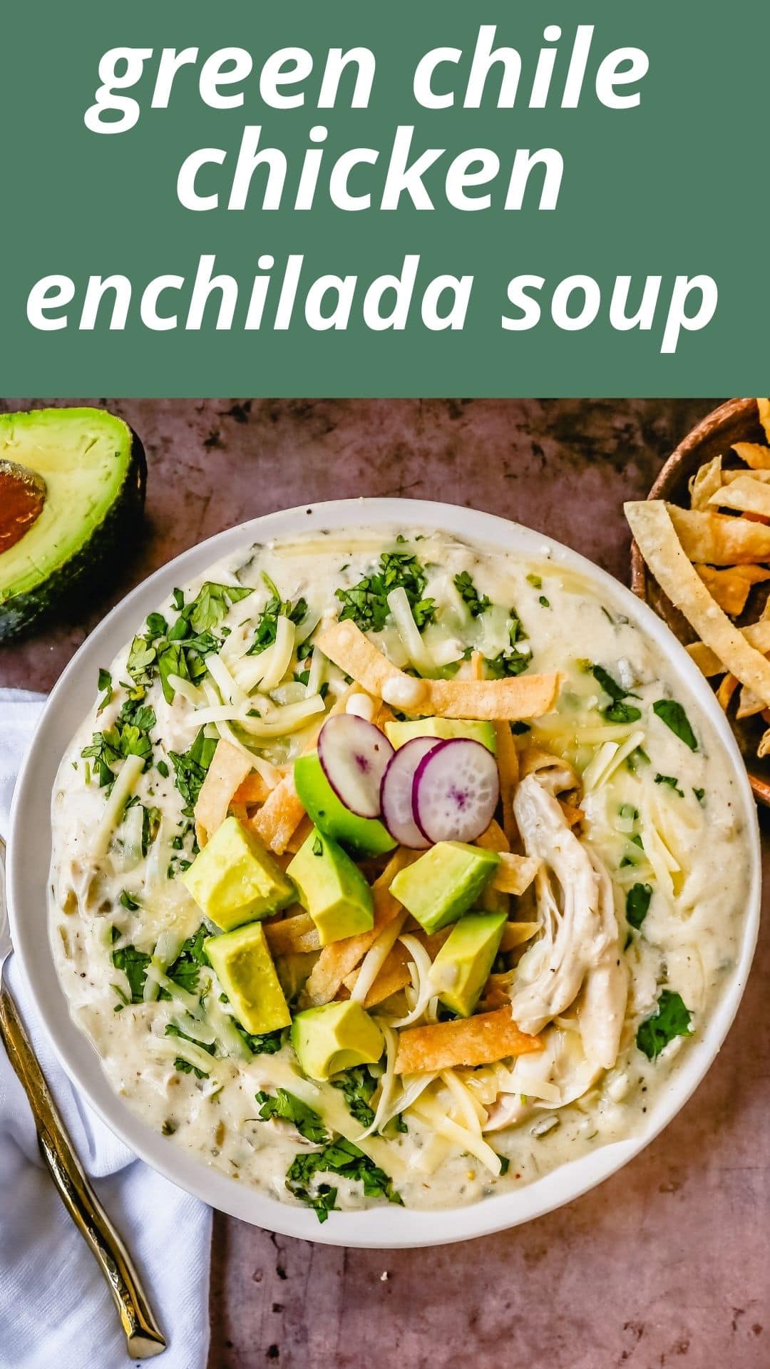 This Green Chile Chicken Enchilada Soup is made with tender chicken, green enchilada sauce, green chilies, cream cheese all in a chicken broth and topped with homemade fried tortilla strips, fresh avocado, cilantro, and Monterey Jack cheese. This is the most flavor-packed creamy green chicken enchilada soup recipe.