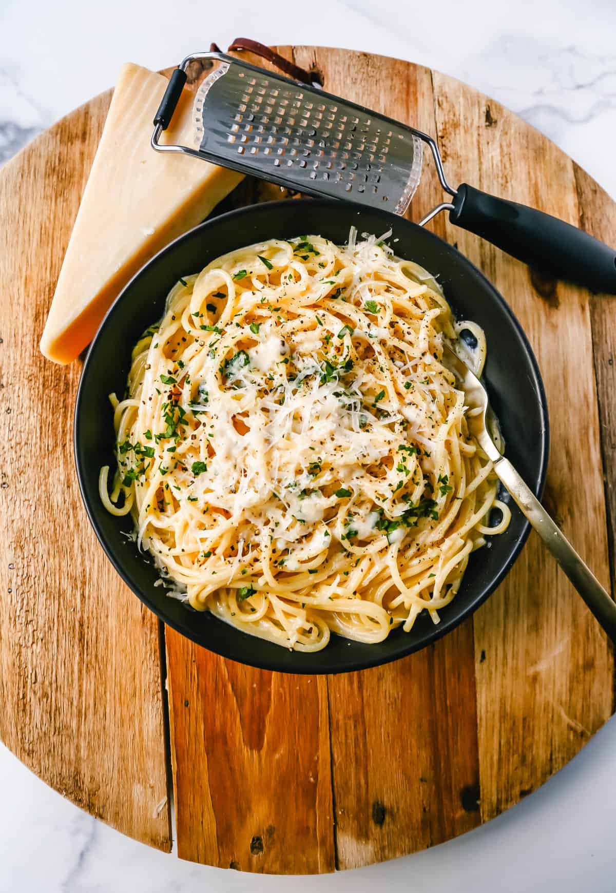 Break-Up Pasta is a creamy 3-Cheese Spaghetti Recipe made with butter, garlic, cream, broth, Italian cheeses, spices, and tossed in spaghetti. It is the best creamy spaghetti recipe known to help cure breakups!