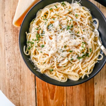 Break-Up Pasta is a creamy 3-cheese spaghetti recipe made with butter, garlic, cream, broth, Italian cheeses, spices and tossed into spaghetti.  This is the best creamy spaghetti recipe known to help cure a breakup!