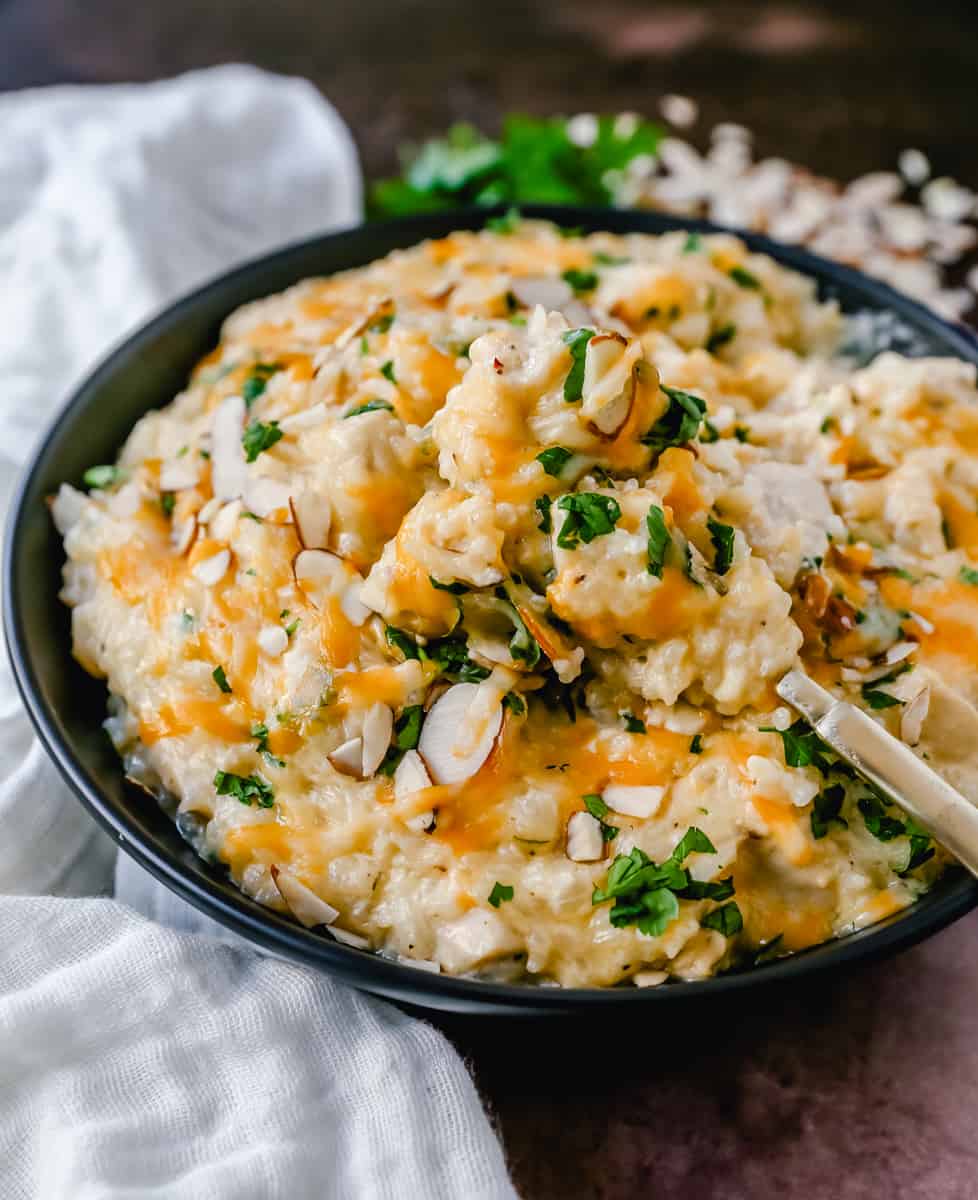 Quick and Easy Cheesy Chicken and Rice all made in one skillet. This 30-minute, no-bake chicken and rice dish is such a crowd pleaser and so easy!