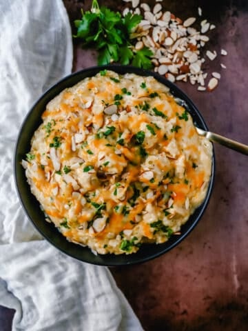 Quick and Easy Cheesy Chicken and Rice all made in one skillet. This 30-minute, no-bake chicken and rice dish is such a crowd pleaser and so easy!