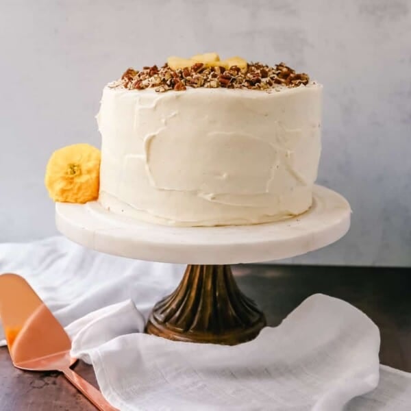 This Hummingbird Cake is a classic Southern dessert. This moist cake is made with pineapple, bananas, pecans, and frosted with a sweet cream cheese frosting.