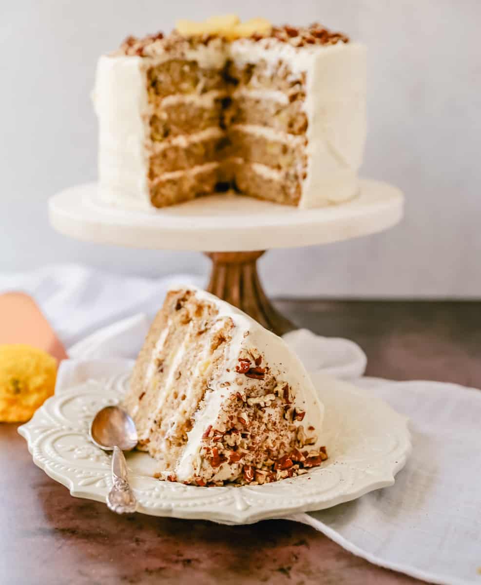 This Hummingbird Cake is a classic Southern dessert. This moist cake is made with pineapple, bananas, pecans, and frosted with a sweet cream cheese frosting.