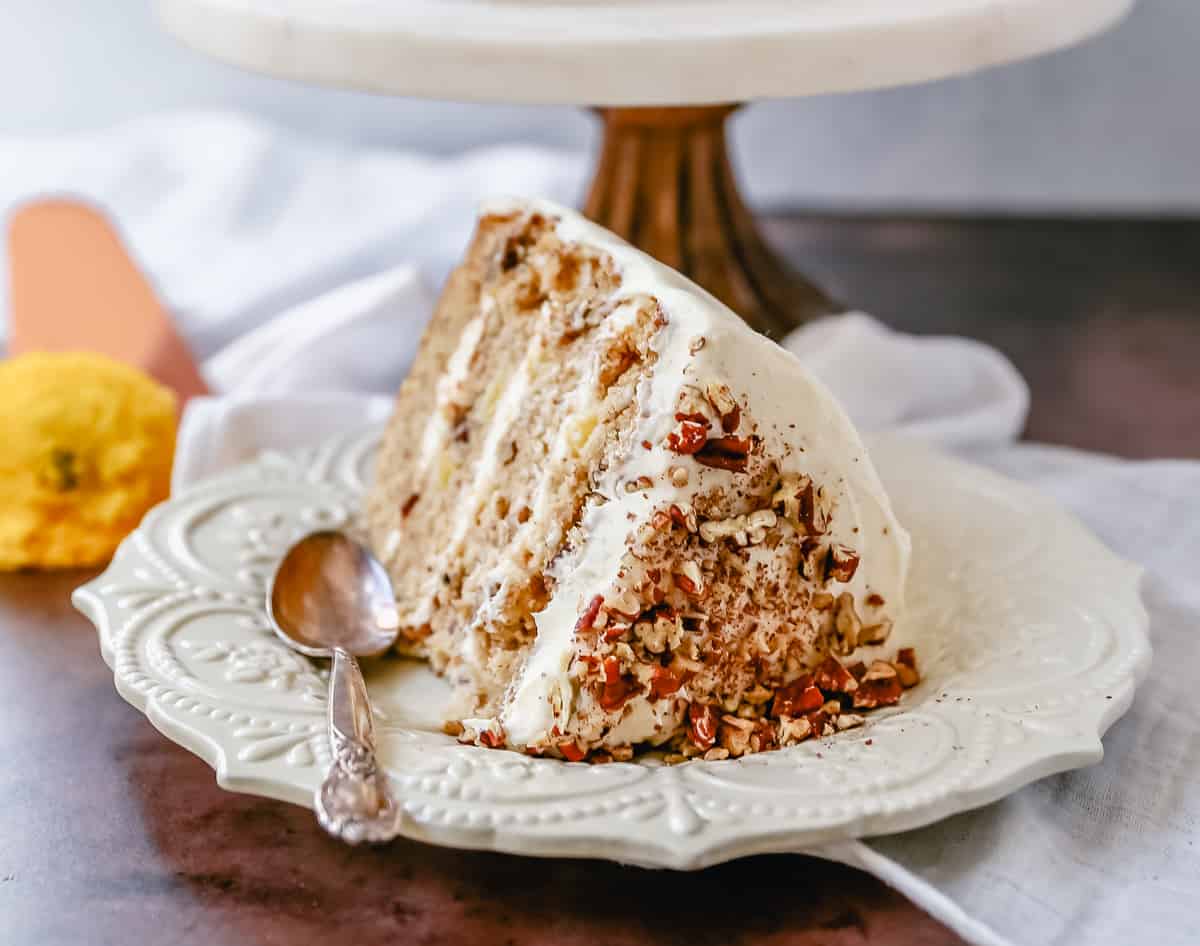 This Hummingbird Cake is a classic Southern dessert. This moist cake is made with pineapple, bananas, pecans, and frosted with a sweet cream cheese frosting.