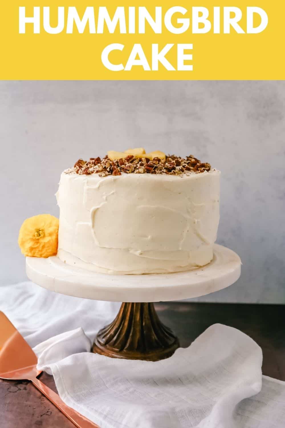 This Hummingbird Cake is a classic Southern dessert. This moist cake is made with pineapple, bananas, pecans, and frosted with a sweet cream cheese frosting.