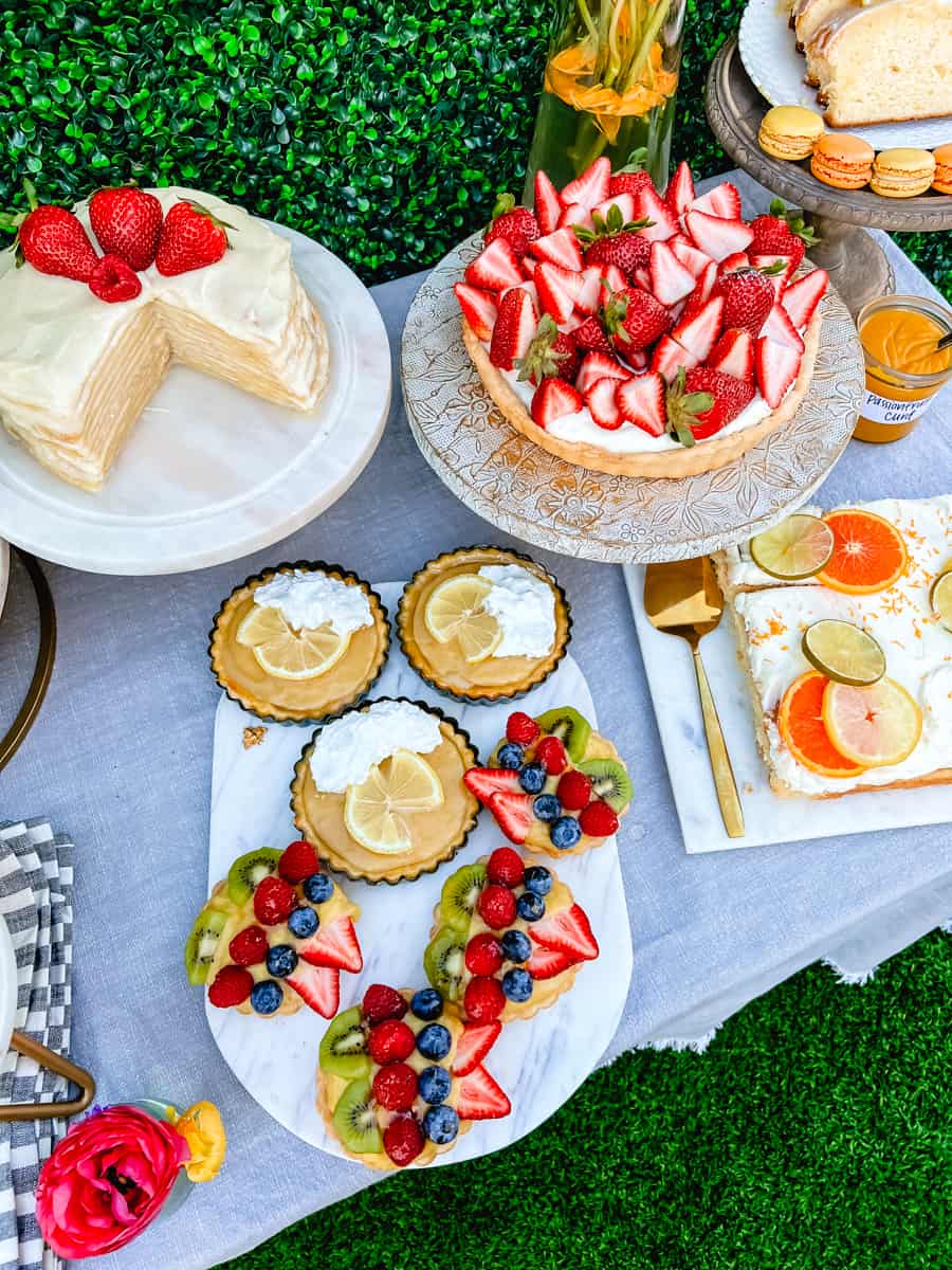 Fruit Tarts, Lemon Cream Pie, Strawberry Tart, and Crepe Cake. How to create the Ultimate Spring Brunch or Spring Party with an assortment of both sweet and savory breakfast items and beautiful desserts. 30+ Spring and Easter Party Food Ideas. How to decorate for a Spring Brunch and Party too.