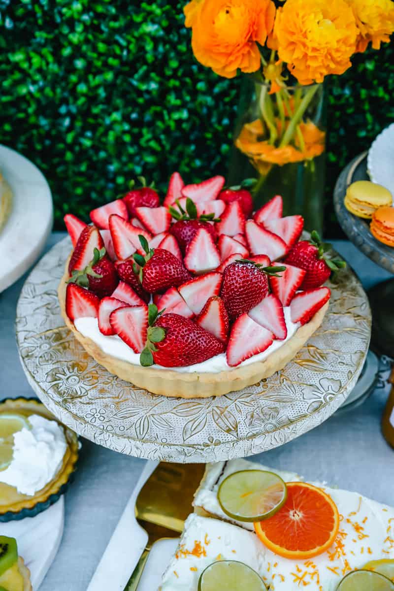 Strawberry Tart. How to create the Ultimate Spring Brunch or Spring Party with an assortment of both sweet and savory breakfast items and beautiful desserts. 30+ Spring and Easter Party Food Ideas. How to decorate for a Spring Brunch and Party too.