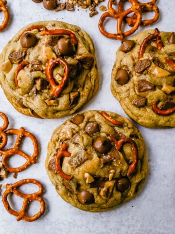 Toffee Chocolate Chip Pretzel Cookies are made with chocolate toffee chunks, salty pretzels, and milk chocolate chips. The perfect salty and sweet bakery cookie!