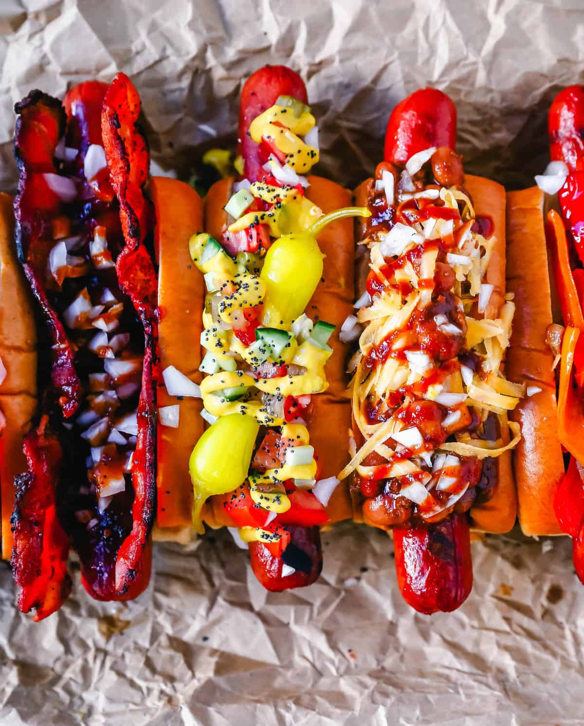 Chicago Hot Dog. Chicago Dog Toppings. How to create the ultimate Gourmet Hot Dogs with all of the delicious hot dog toppings. You can create famous hot dogs such as Chicago Dogs, Chili Dogs, and even BBQ Bacon Dogs. Tips on how to turn an ordinary hot dog into the most flavorful hot dog you will ever eat!