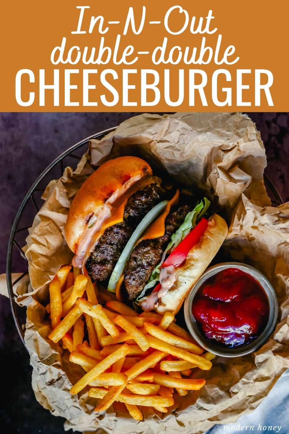 Classic All-American Cheeseburger with Cheddar Cheese and topped with burger sauce, lettuce, tomatoes, and onion. How to make the best homemade grilled cheeseburger...just like the In-N-Out Double-Double!