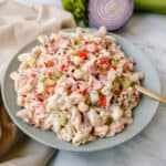 The best creamy macaroni salad recipe made with pasta, vegetables, and a creamy homemade sweet and tangy dressing. An easy, traditional macaroni salad recipe!