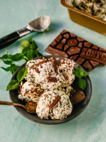Creamy homemade mint chocolate chip ice cream with fresh cream, mint flavoring, and chocolate chunks. This homemade mint chip ice cream is the perfect summer treat! Here are two recipes -- a classic mint chocolate chip ice cream made in an ice cream maker and an easy, no-churn mint chocolate chip ice cream that requires no ice cream maker.