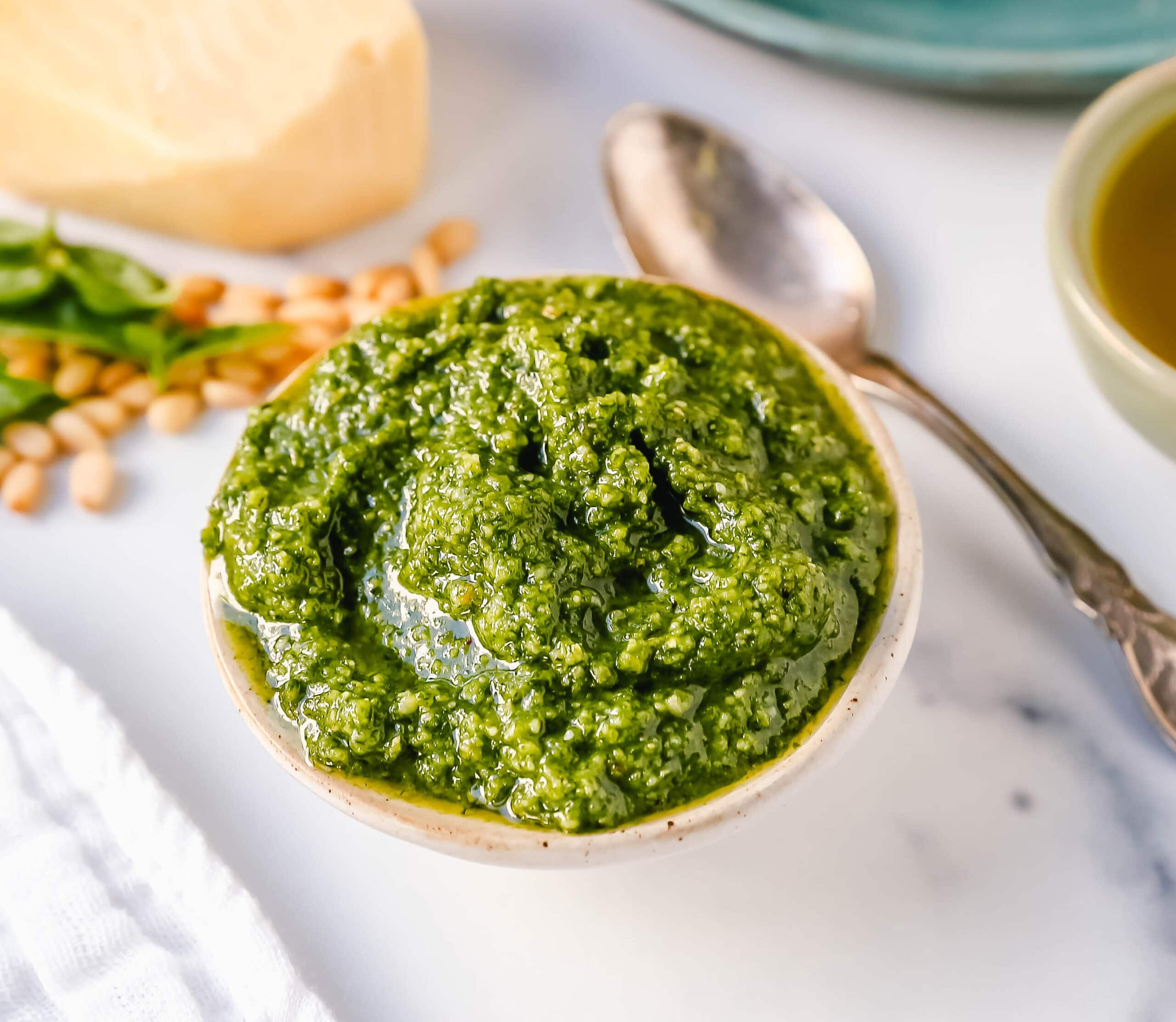 Homemade Basil Pesto Sauce made with fresh basil, extra-virgin olive oil, pine nuts, garlic, parmesan cheese, and salt and pepper. This pesto sauce is the best recipe and can be used on pasta, pizza, sandwiches, or to be used as a dip with rustic French bread.