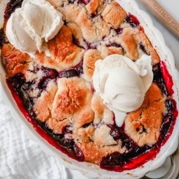 This is the best cherry cobbler recipe!  This old-fashioned cherry cobbler is made with fresh, lightly sweetened cherries and is topped with a sweet, buttery, homemade cobbler crust.  You will love this easy cherry cobbler recipe!