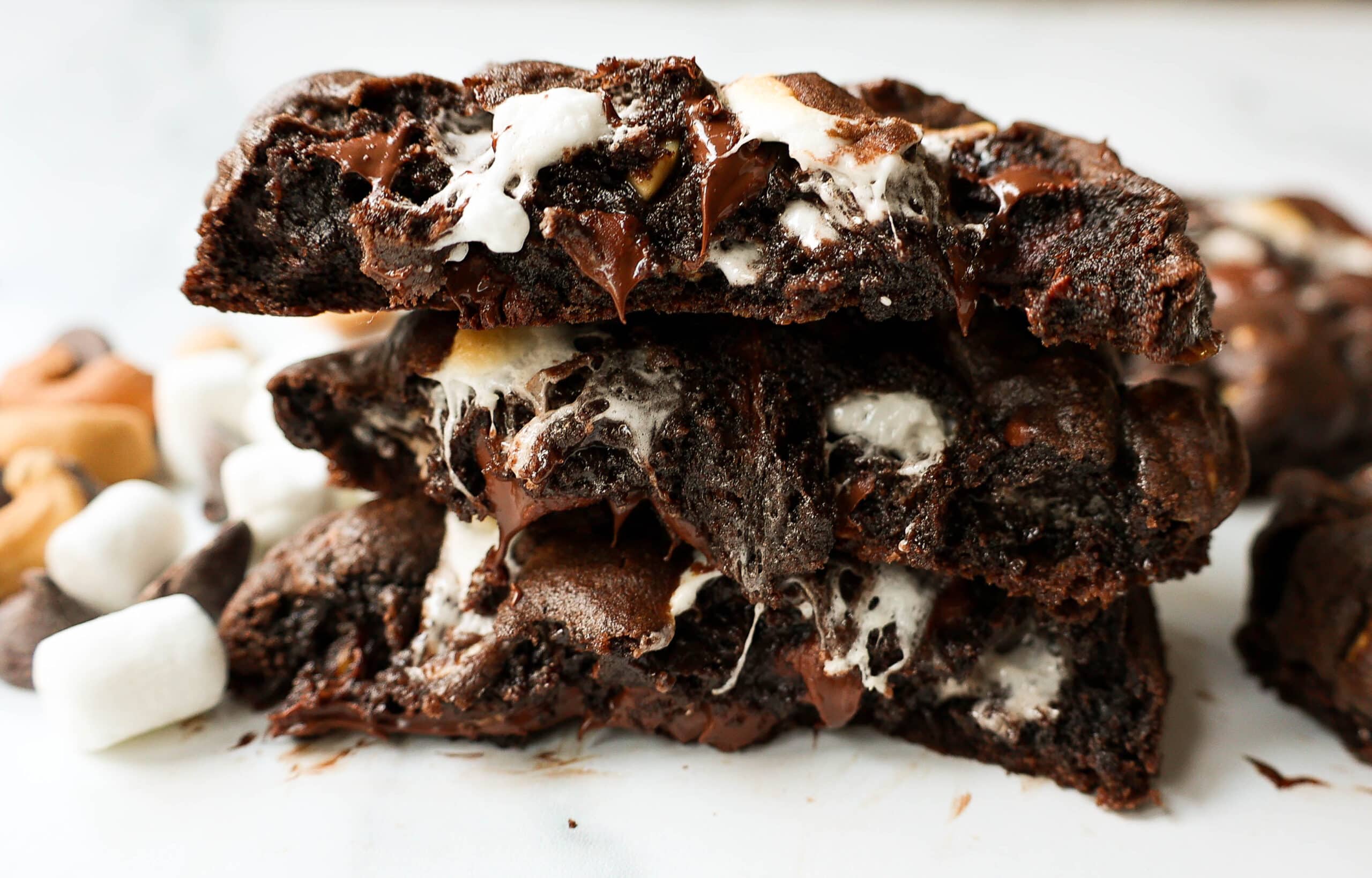 These Levain Bakery Rocky Road Cookies are rich, thick, soft, chewy chocolate cookies with semi-sweet chocolate chips, mini marshmallows, and cashews. The best Levain Bakery Copycat Rocky Road Cookie Recipe!