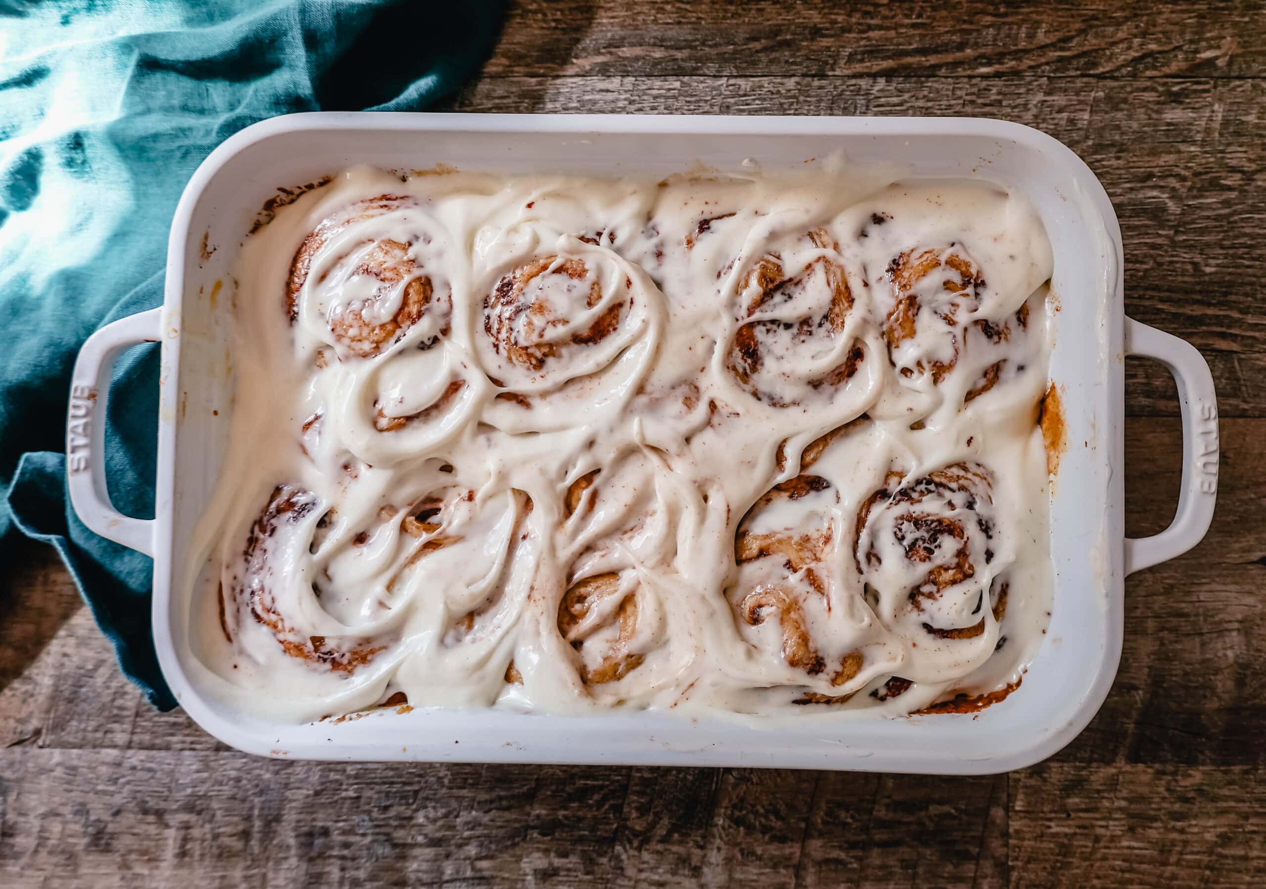 The famous, viral TikTok Cinnamon Rolls with heavy cream are even better than Cinnabon! These TikTok Cinnamon Rolls made with canned cinnamon rolls, a homemade buttery cinnamon drizzle, and a cream cheese frosting are the easiest cinnamon rolls you will ever make! 