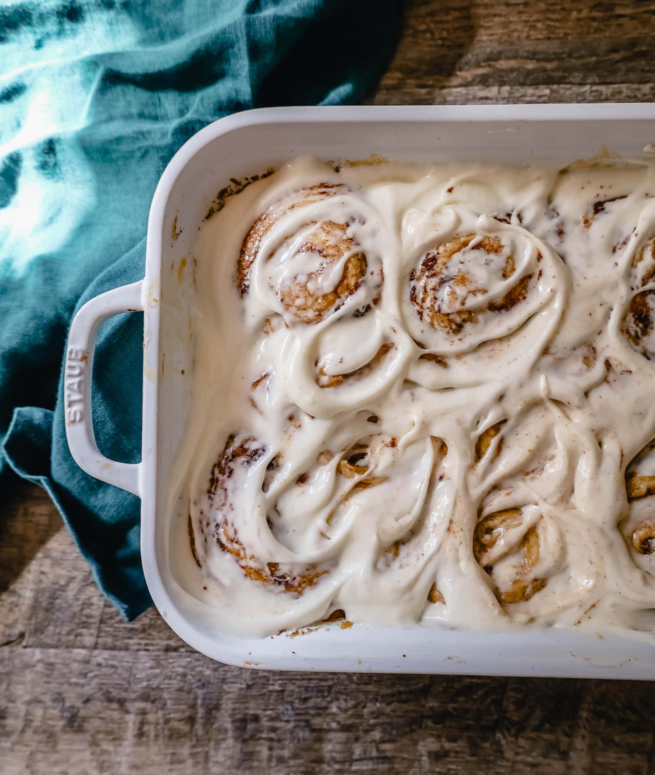 The famous, viral TikTok Cinnamon Rolls with heavy cream are even better than Cinnabon! These TikTok Cinnamon Rolls made with canned cinnamon rolls, a homemade buttery cinnamon drizzle, and a cream cheese frosting are the easiest cinnamon rolls you will ever make! 