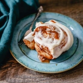 The famous, viral TikTok Cinnamon Rolls with heavy cream are even better than Cinnabon! These TikTok Cinnamon Rolls made with canned cinnamon rolls, a homemade buttery cinnamon drizzle, and a cream cheese frosting are the easiest cinnamon rolls you will ever make!