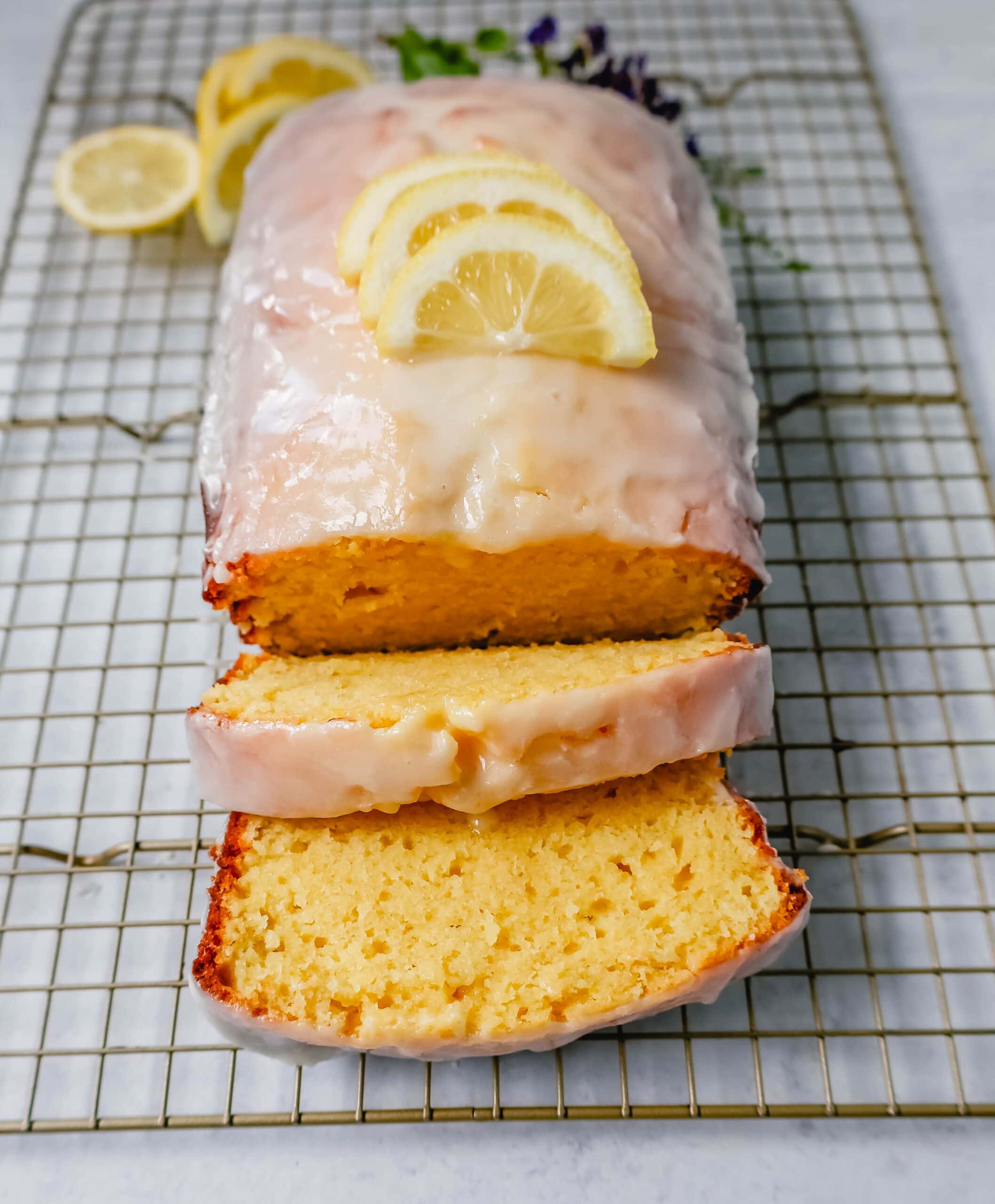 This moist Lemon Bread is even better than the Starbucks lemon loaf! This lemon loaf is made with fresh lemon juice, lemon zest, and lemon extract for an extra burst of lemon flavor. This is the best lemon bread recipe ever!