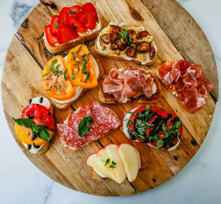 How to make bruschetta with all of the bruschetta topping ideas and bruschetta combinations. Bruschetta is the perfect party appetizer and party food!