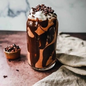 This Chocolate Almond Butter Smoothie is the richest, creamiest healthy chocolate protein shake made with almond butter. This tastes like a chocolate milkshake and you will forget you are drinking a chocolate protein shake!