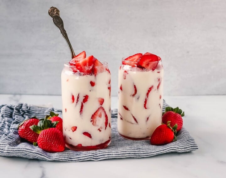 This Fresas con Crema is an authentic Mexican dessert made with fresh sliced Strawberries, Mexican Crema, Heavy Cream, and Sweetened Condensed Milk. This is the best Strawberries and Cream recipe!