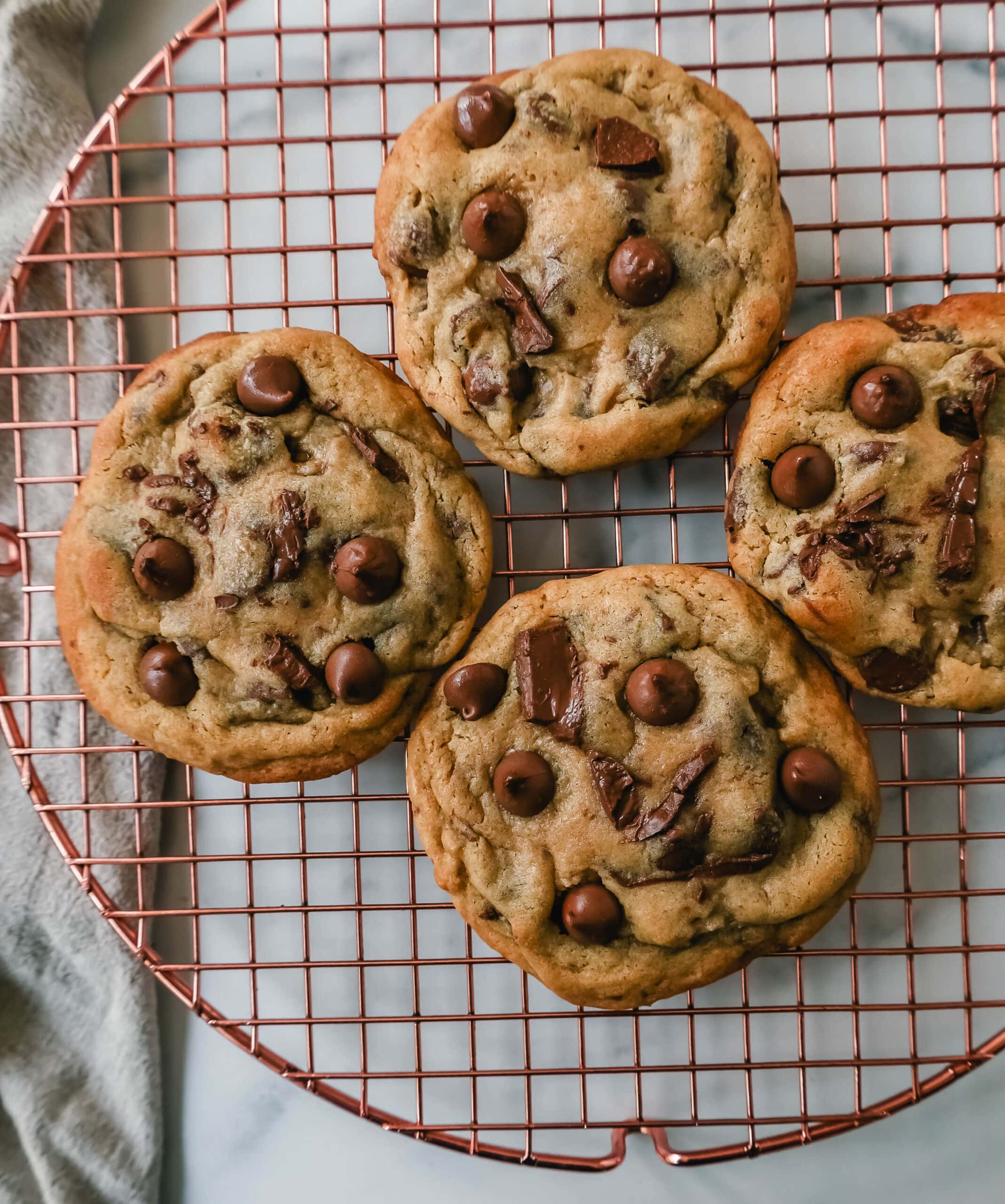 Thick, chewy milk chocolate chip cookies have the perfect chewy centers with a lot of melted chocolate and slightly crispy edges. The best milk chocolate chip cookie recipe!