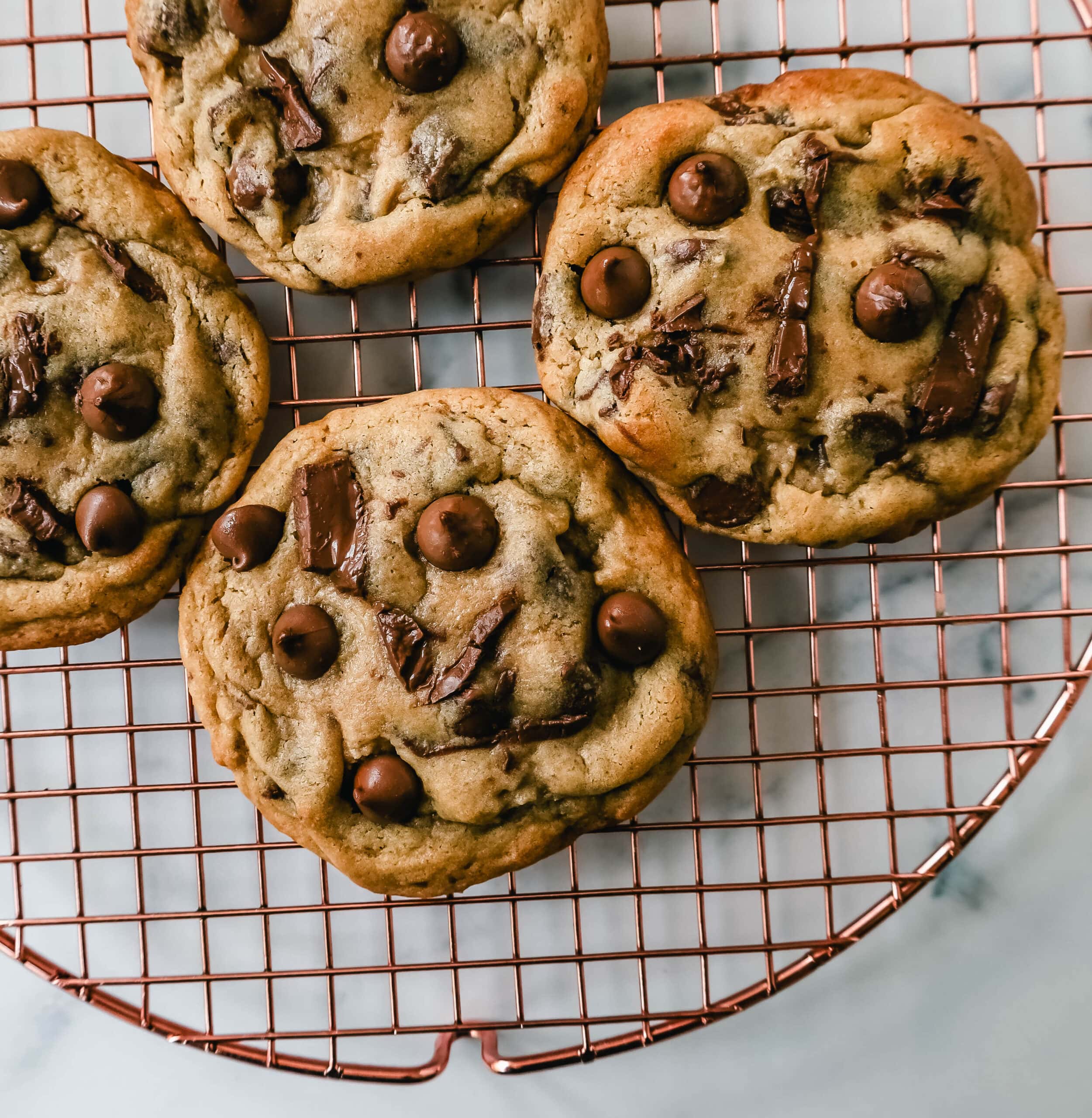 Thick, chewy milk chocolate chip cookies have the perfect chewy centers with a lot of melted chocolate and slightly crispy edges. The best milk chocolate chip cookie recipe!