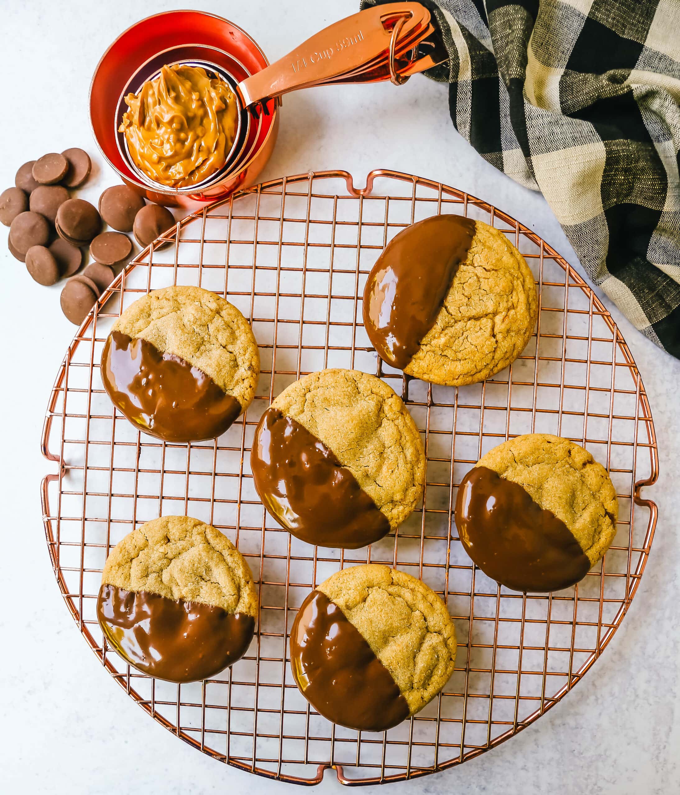 Soft, chewy homemade peanut butter cookies dipped in melted chocolate. This peanut butter and chocolate cookie is rich and decadent and perfect for chocolate peanut butter lovers!