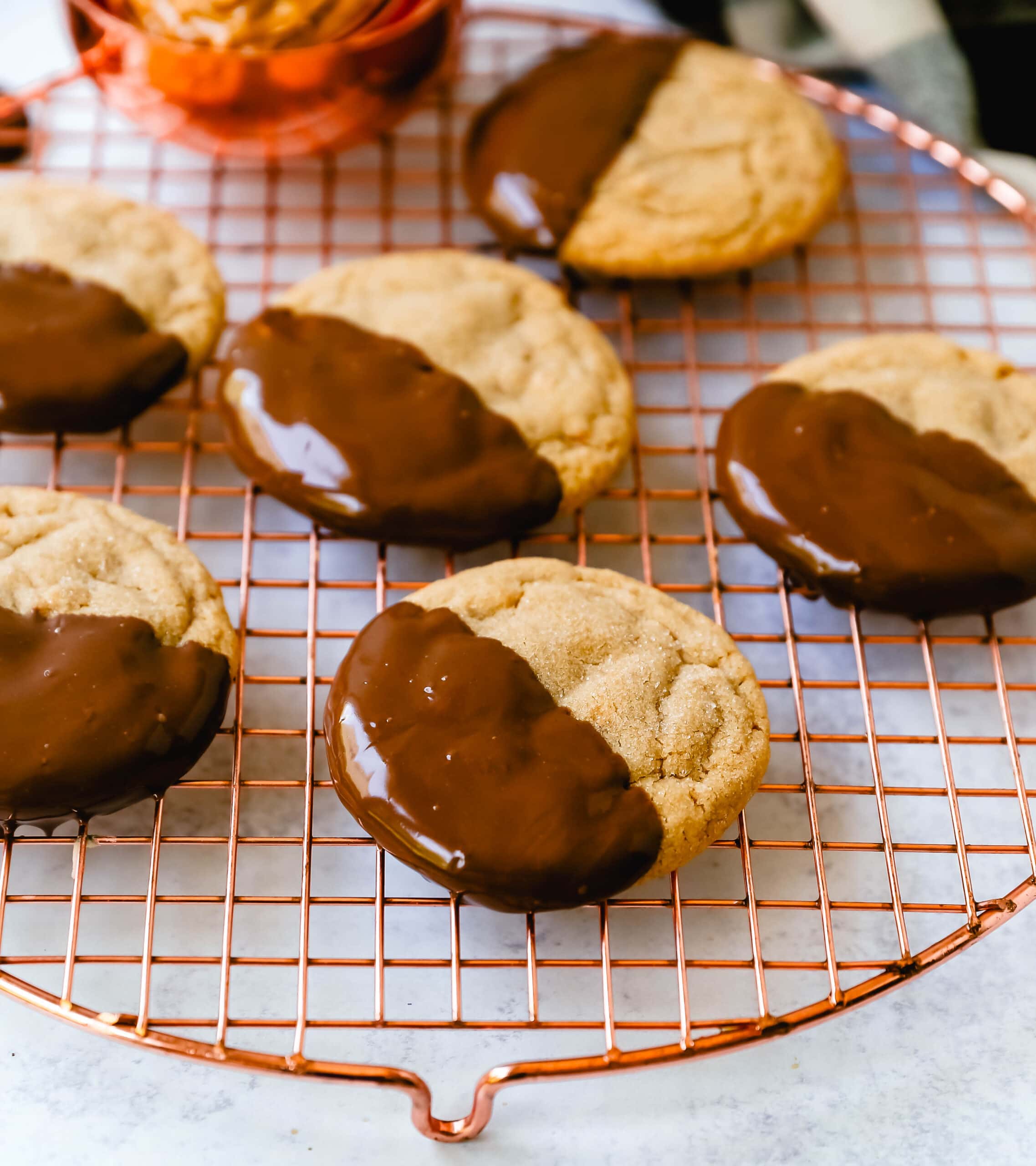 Soft, chewy homemade peanut butter cookies dipped in melted chocolate. This peanut butter and chocolate cookie is rich and decadent and perfect for chocolate peanut butter lovers!