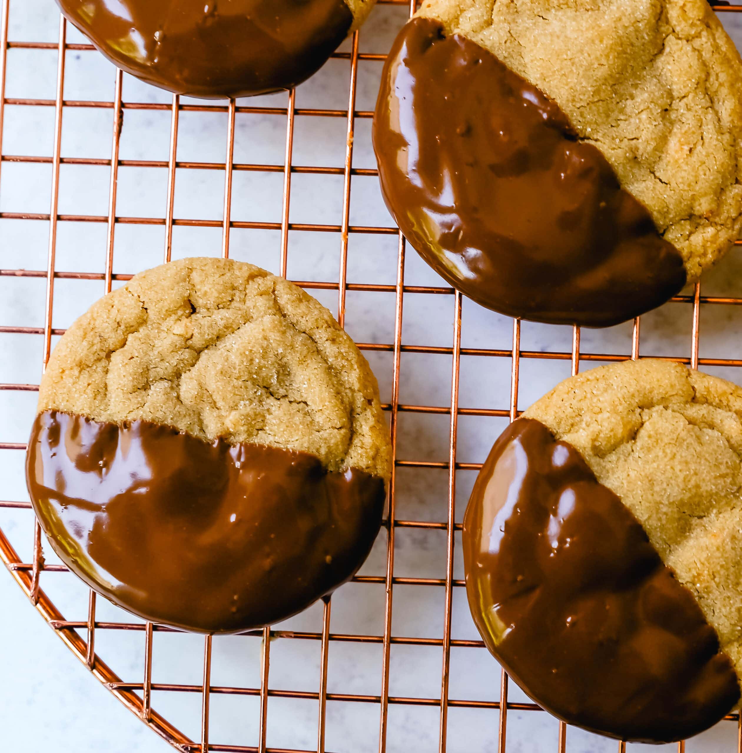 Soft, chewy homemade peanut butter cookies dipped in melted chocolate. This peanut butter and chocolate cookie is rich and decadent and perfect for chocolate peanut butter lovers!