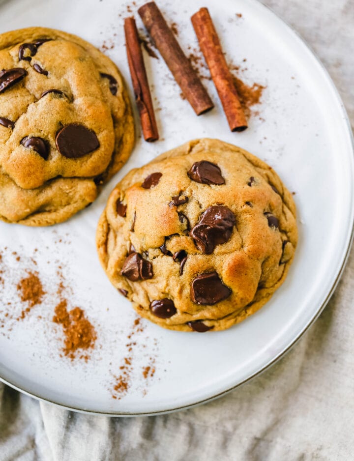 Soft, chewy Fall cookie with dark brown sugar, molasses, cinnamon, ginger, cloves, nutmeg, and chocolate chips for the perfect Autumn cookie. This is the perfect Fall spiced chocolate chip cookie recipe!