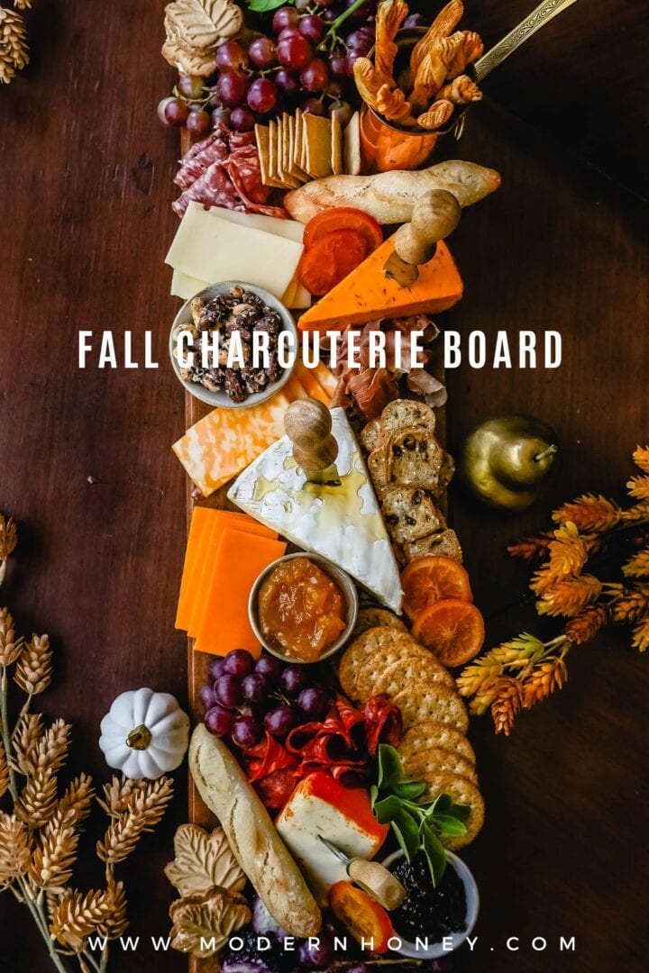 Festive Charcuterie Board perfect to celebrate Thanksgiving or Friendsgiving with friends and family. How to pick out the perfect meats, cheeses, fruits, jams, crackers, and dips for your Fall charcuterie spread. Tips and tricks for making the best charcuterie board.