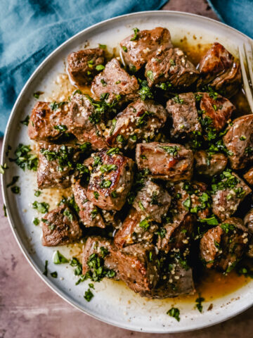 Quick, easy, tender, and flavorful Steak Bites with Garlic Butter. These Garlic Butter Steak Bites are made in less than 10 minutes and are a perfect protein source for any meal.
