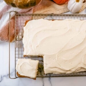 Pumpkin Bars with Cream Cheese Frosting are moist, pumpkin spiced bars topped with homemade sweet cream cheese frosting. The best pumpkin bar recipe!