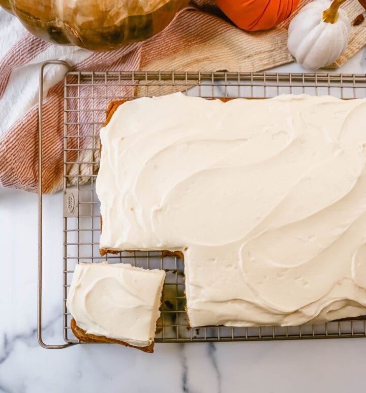 Pumpkin Bars with Cream Cheese Frosting are moist, pumpkin spiced bars topped with homemade sweet cream cheese frosting. The best pumpkin bar recipe!