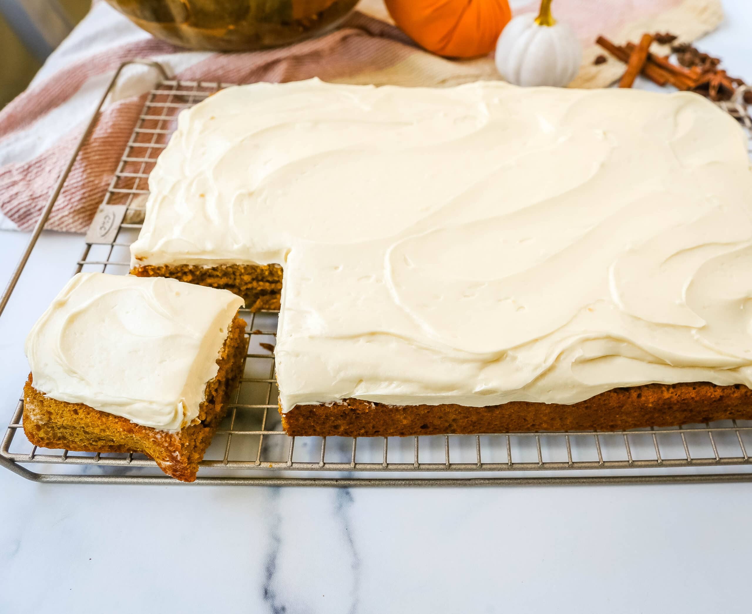 Pumpkin Bars with Cream Cheese Frosting are moist, pumpkin spiced bars topped with homemade sweet cream cheese frosting. The best pumpkin bar recipe!