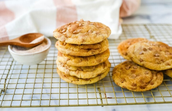 Cinnamon Chip Sugar Cookies are snickerdoodle cookies rolled in cinnamon sugar and studded with cinnamon chips for the perfect cinnamon sugar cookie! The best soft and chewy cinnamon chip cookie recipe.