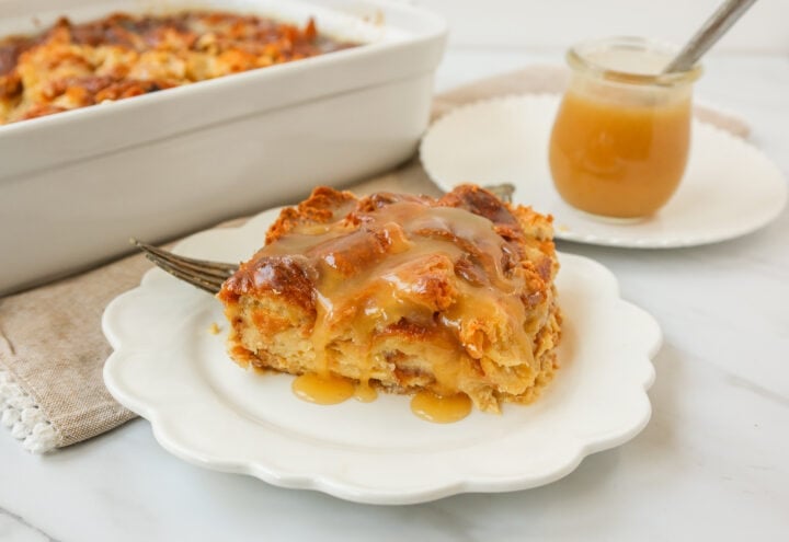  Croissant Bread Pudding with Vanilla Sauce is made with croissants baked in a custard sauce and topped with a homemade vanilla bean sauce. The most decadent dessert or breakfast recipe!