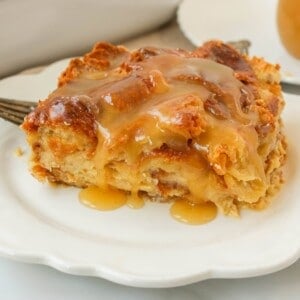  Croissant Bread Pudding with Vanilla Sauce is made with croissants baked in a custard sauce and topped with a homemade vanilla bean sauce. The most decadent dessert or breakfast recipe!