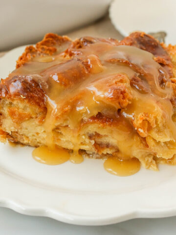  Croissant Bread Pudding with Vanilla Sauce is made with croissants baked in a custard sauce and topped with a homemade vanilla bean sauce. The most decadent dessert or breakfast recipe!