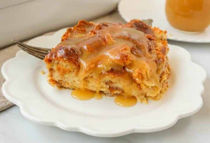 Croissant Bread Pudding with Vanilla Sauce is made with croissants baked in a custard sauce and topped with a homemade vanilla bean sauce. The most decadent dessert or breakfast recipe!