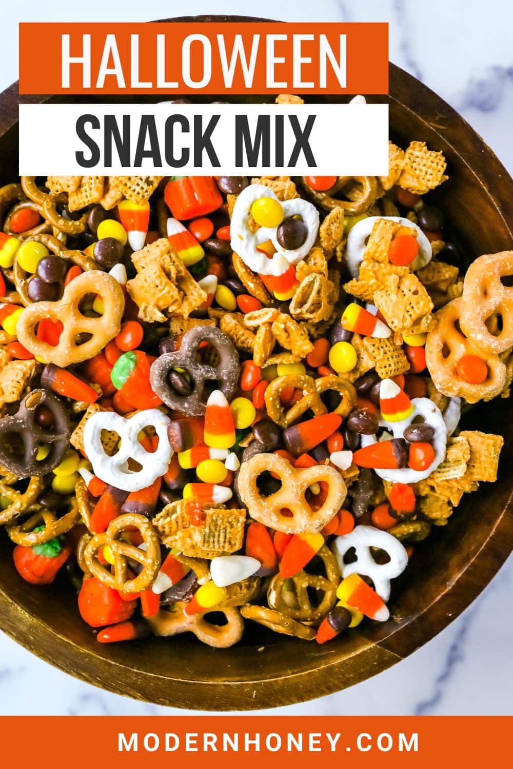 This Halloween Sweet and Salty Snack Mix is made with salty pretzels, butterscotch-tossed Chex cereal, candy corn, Reese's Pieces, and chocolate-covered pretzels. You can even add in some salty peanuts or caramel corn for a more salty and sweet combination. This is the perfect Fall sweet snack mix.