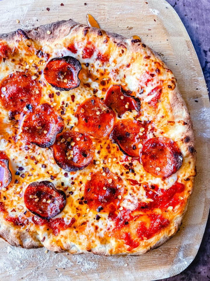 Pepperoni Pizza with Hot Honey and Red Chili Flakes. How to make the best homemade pepperoni pizza at home with homemade pizza dough that makes the perfect crispy yet chewy crust. Tips and tricks for making gourmet pizza at home!