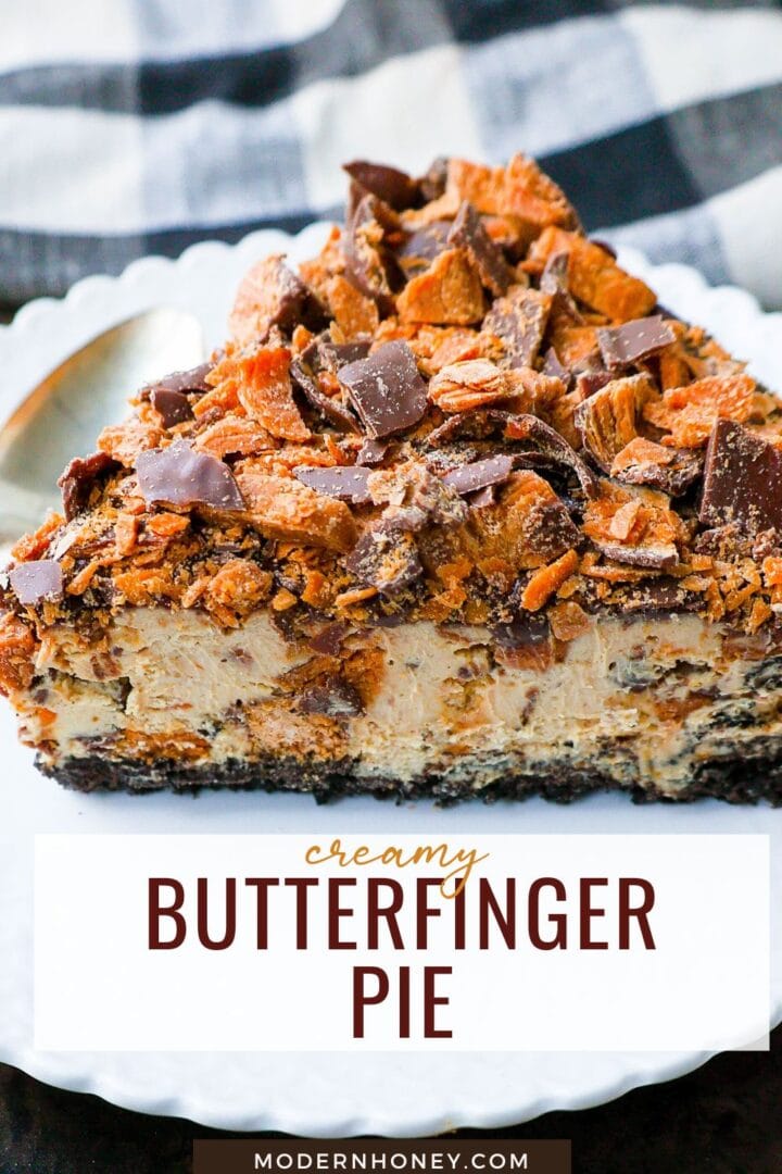 No-Bake Chocolate Peanut Butter Butterfinger Pie with a chocolate OREO crust, creamy peanut butter filling with Butterfinger candy bars, chocolate ganache, and topped with fresh whipped cream and Butterfinger. The best creamy Butterfinger pie recipe!