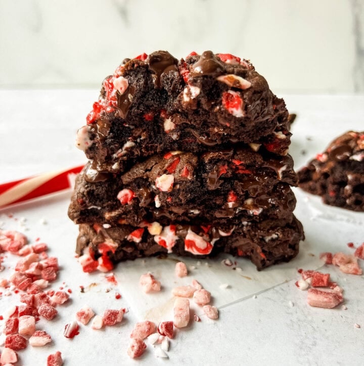 Thick, soft, chewy bakery-style chocolate peppermint cookie recipe. This Levain Bakery Chocolate Peppermint Cookie is made with a rich double chocolate cookie and peppermint chips. The perfect Christmas cookie recipe!