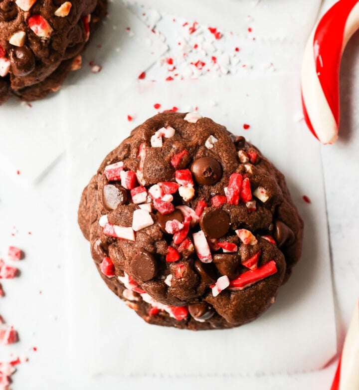 Thick, soft, chewy bakery-style chocolate peppermint cookie recipe. This Levain Bakery Chocolate Peppermint Cookie is made with a rich double chocolate cookie and peppermint chips. The perfect Christmas cookie recipe!